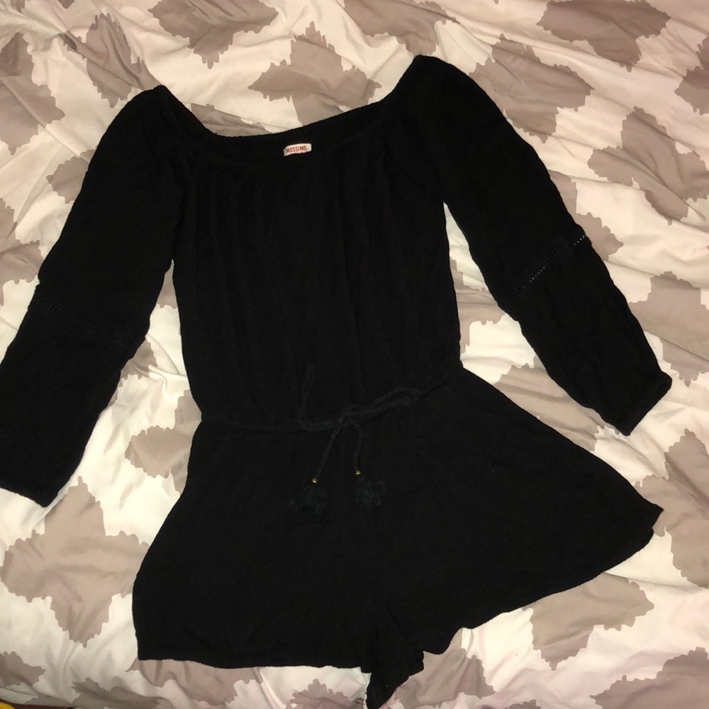 a black off the shoulder romper